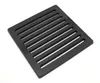 A black cast iron grate on a white background. Produktbild-Vorschau