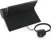 A black kitchen dock with a power adapter on a white background. Produktbild-Vorschau