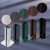 A display of five different colored post bases for fences, each with a small circular swatch above it showing its color. Produktbild-Vorschau