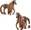 Two toy horses with long manes, one with hair accessories. Voir les images du produit