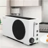 A white toaster with a black circular grill on the side, resembling an Xbox Series S console, sits on a kitchen counter. Anteprima dell’immagine prodotto