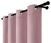 A close-up view of several pink velvet curtains hanging on a black curtain rod. Náhľad obrázku produktu
