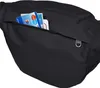 A close-up of a black hip bag with cards in a zippered pocket. Anteprima dell’immagine prodotto