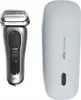 A silver electric shaver and its charging case are displayed side-by-side against a white background. Produktbild-Vorschau