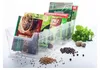 A clear plastic organizer filled with various spice packets, with loose spices and nutmeg scattered around it on a white surface. Fresh mint leaves are also visible. Náhľad obrázku produktu
