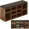A shoe rack with a padded bench top. Anteprima dell’immagine prodotto