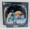 A box for a children's advent calendar with a space theme. Produktbild-Vorschau