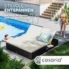 A man relaxing by a pool and a woman in a bikini walking near a lounge chair with a table and a drink. Produktbild-Vorschau