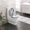 A toilet with a decorative lid in a bathroom setting. Produktbild-Vorschau