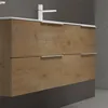 A close-up view of a modern bathroom vanity with wooden drawers and a white countertop. Produktbild-Vorschau