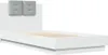 A white bed frame with a tufted gray headboard, shown from a side angle. Anteprima dell’immagine prodotto