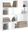 A white bookshelf filled with decorative items and books. Podgląd zdjęcia produktu