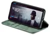 A smartphone in a green flip case is shown displaying a movie poster on its screen. Produktbild-Vorschau