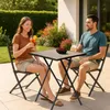 A man and woman enjoying drinks on a patio. Anteprima dell’immagine prodotto