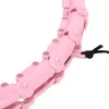 A close-up shot of a pink hula hoop. Podgląd zdjęcia produktu