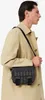 A man wearing a trench coat and a crossbody bag. Anteprima dell’immagine prodotto