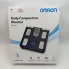 The image shows the retail packaging of an Omron BF511 Body Composition Monitor. Podgląd zdjęcia produktu