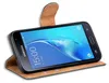 A Samsung Galaxy J5 2016 smartphone in a brown flip case. Podgląd zdjęcia produktu