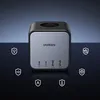 A Ugreen charging station is shown with various safety icons around it. Produktbild-Vorschau