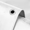 A close-up view of a white tarp with a metal grommet. Náhled obrázku produktu