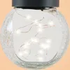 A close-up shot of a solar-powered globe light with LED string lights inside. Produktbild-Vorschau