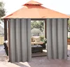 Outdoor gazebo with curtains, furniture, and plants. Náhled obrázku produktu