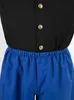Close-up of a black top with gold buttons and blue pants with an elastic waistband. Anteprima dell’immagine prodotto