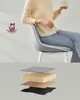 A person sitting on a chair with a layered diagram of the seat cushion below. Náhled obrázku produktu