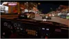 A first-person view of a racing video game at night, with several cars on a city street. Produktbild-Vorschau