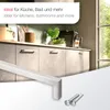Product image featuring cabinet handles and screws, with a kitchen scene in the background. Produktbild-Vorschau