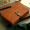 A close-up shot of a vintage-style notebook with a combination lock. Náhľad obrázku produktu