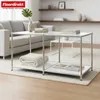 A modern living room with a sofa, coffee table, and shelves. Anteprima dell’immagine prodotto