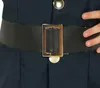 Close-up of a belt buckle on a dark blue uniform. Náhľad obrázku produktu