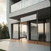 A modern house with a patio and an awning extended over sliding glass doors. Produktbild-Vorschau