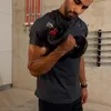 A man is performing bicep curls with a dumbbell in a gym or home workout space. Produktbild-Vorschau