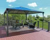 A gazebo with outdoor furniture on a deck, surrounded by greenery and a blue sky. Náhled obrázku produktu