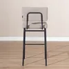 A back view of a bar stool against a light-colored wall and wooden floor. Produktbild-Vorschau