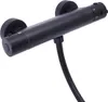 A black thermostatic shower mixer tap mounted on a white background. Produktbild-Vorschau