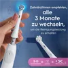 A hand holding an electric toothbrush head, with text about changing brush heads every 3 months. Náhľad obrázku produktu