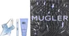 A gift set of Thierry Mugler Angel perfume, including a perfume bottle, a travel spray, and a body lotion, alongside the product's packaging. Podgląd zdjęcia produktu
