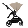 A side view of a beige and black Kinderkraft Yoxi 3in1 stroller against a white background. Voir les images du produit