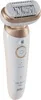 A studio shot of a white and gold Braun Silk-epil 9 Flex epilator against a white background. Náhled obrázku produktu