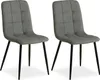 Two gray upholstered dining chairs with black metal legs are shown against a white background.