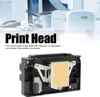 A close-up of a printer print head with a blurred background of printers and office equipment. Produktbild-Vorschau
