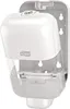 A white Tork soap dispenser is mounted on a wall, shown from a diagonal angle. The dispenser is open, revealing the internal mechanism. Anteprima dell’immagine prodotto