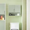 A bathroom scene with a toilet and wall-mounted cabinets. Náhled obrázku produktu