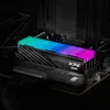A close-up shot of a computer RAM module with RGB lighting, installed on a motherboard. Produktbild-Vorschau