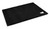 A black bath mat with a silver logo tag on the corner, shown on a white background. Podgląd zdjęcia produktu