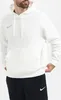 A man wearing a white Nike hoodie and black Nike sweatpants. Produktbild-Vorschau