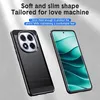 A black phone case and a smartphone with a green wallpaper are displayed against a textured gray background. Produktbild-Vorschau